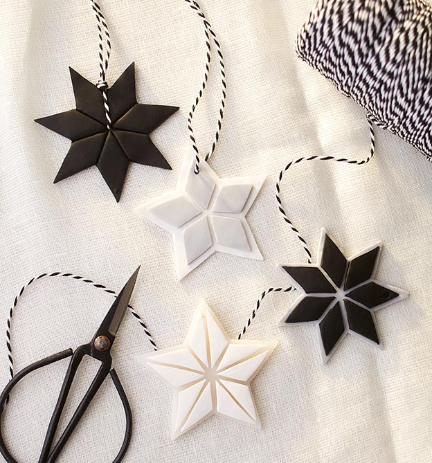Schwarze und weiße Sterne mit Fimo