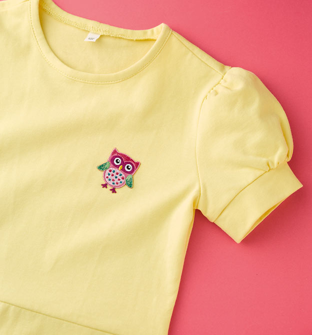 Kinderkleidung nähen: Modell für ein gelbes Kleid mit Eule
